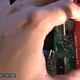 Drilling into the Xbox 360 Silm's DVD board made modding possible.